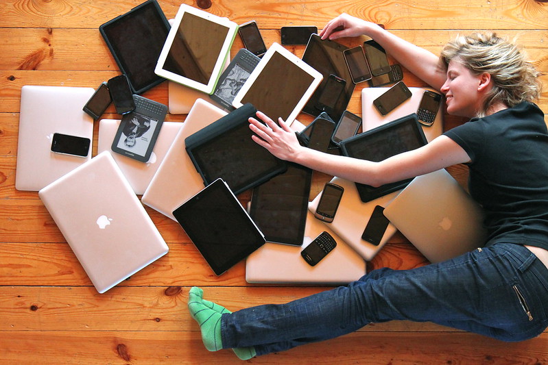 tablets, phones, laptops, woman. photo Luke Wroblewski